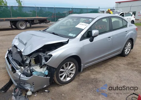 2013 Subaru Impreza 2.0I Premium z USA, uszkodzony, nr VIN JF1GJAC62DH013993